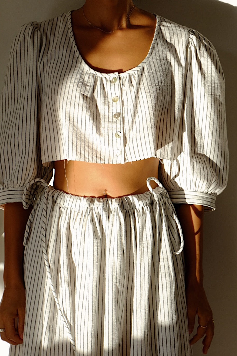 cotton stripe puff sleeve crop top with shell buttons
