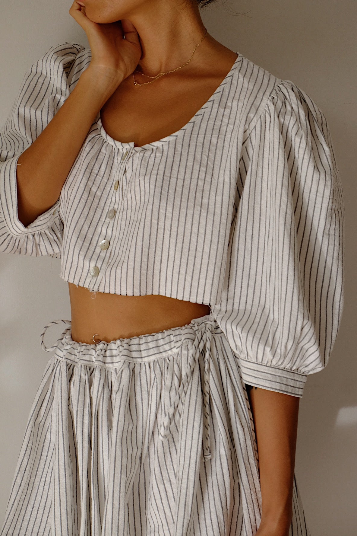 cotton stripe puff sleeve crop top with shell buttons