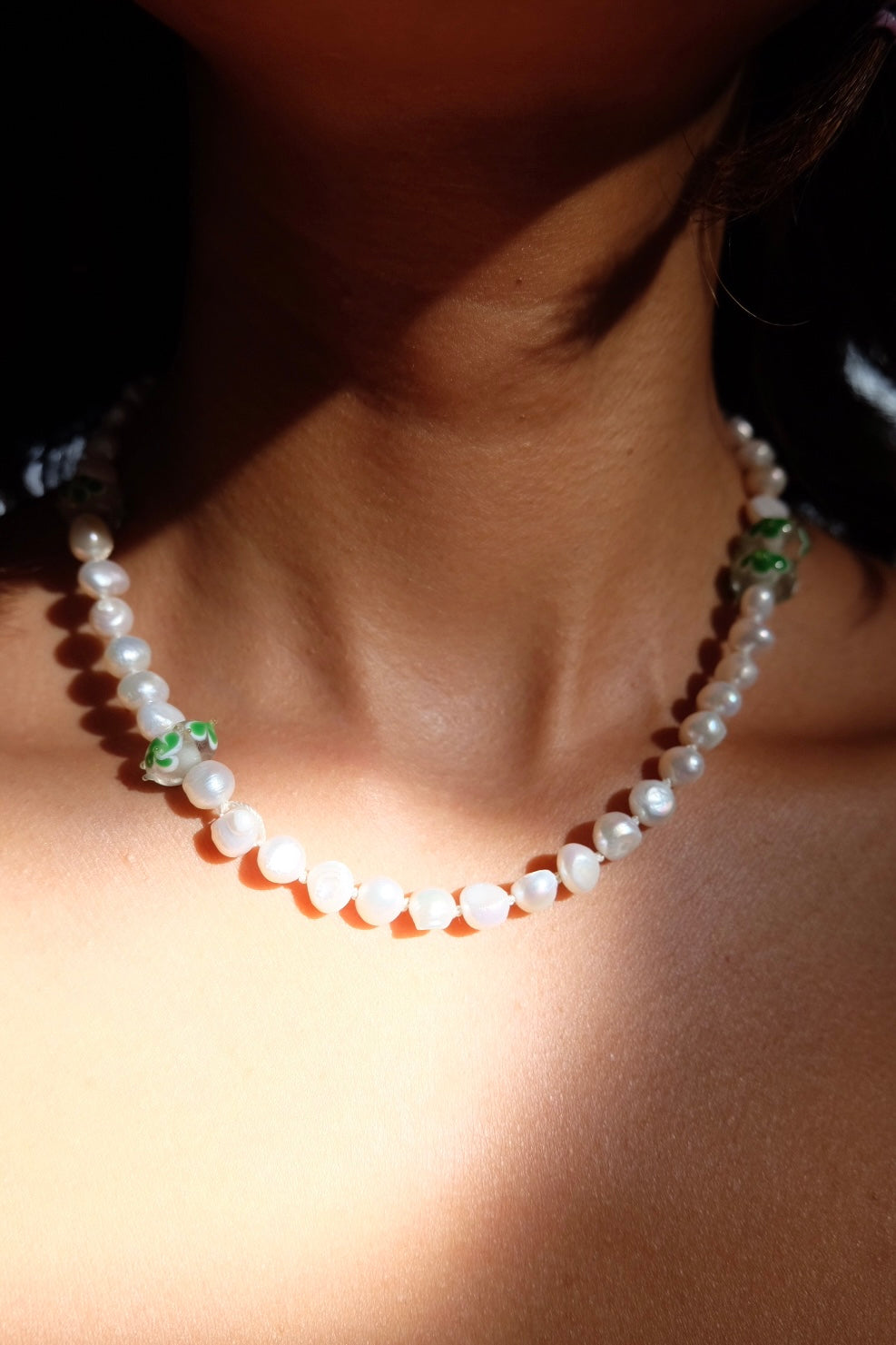 pearl necklace with glass beads point